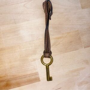 Gold fossil chain and leather strap
